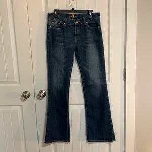 Medium wash flared denim jeans. 7 for all Mankind.  Size 32.